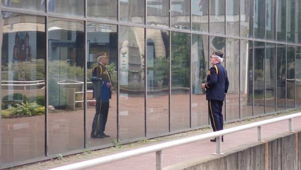 A veteran looks into a reflection outside City Hall, Corning, NY thumbnail