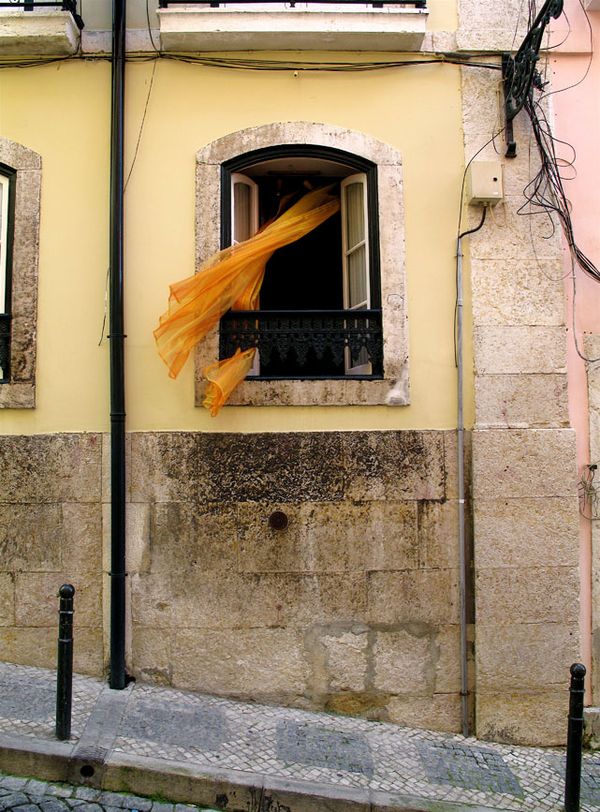 A window on a steep street in Lisbon, Portugal. thumbnail