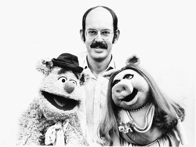 The Muppet Show Puppeteer Frank Oz Actor poses with Muppets Fozzie Bear Miss Piggy