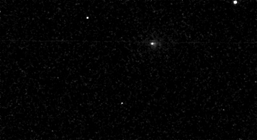 image of a fuzzy, white dot across space