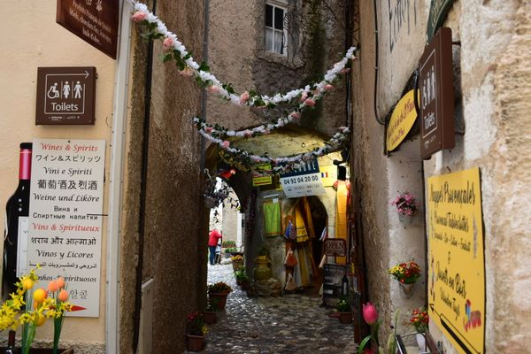 An collection of vendors in the medieval village of St. Paul de Vence thumbnail
