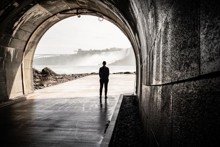 The tunnel opens onto an outdoor platform offering views of Horseshoe Falls.