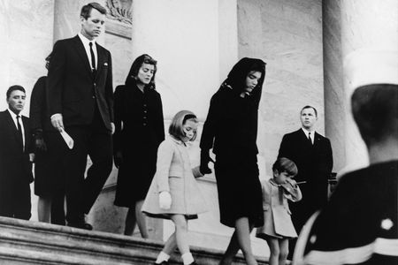 More like something out of a dream than a part of daily life, that weekend indelibly imprinted scenes in American memory: the riderless horse, the rat-a-tat-tat of the muffled drums, the brave widow, the toddler saluting his father’s casket.