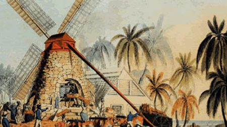 A yard on an Antiguan sugar plantation in 1823. A windmill powers the rollers used to crush the cane before it was boiled to release its sugar.