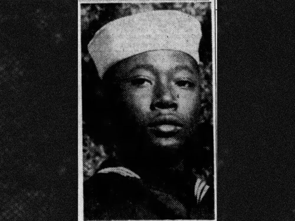 Black and white photo of sailor in uniform