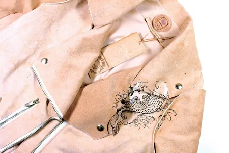 Pure Human features clothing made from leather that is produced from the DNA of designer Alexander McQueen—and that includes freckles, realistically placed tattoos and even sunburns. 