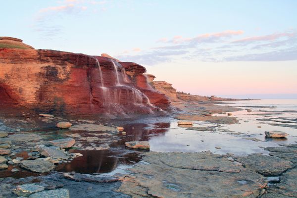 Red cliff in remote region of St-Lawrence-Bay thumbnail