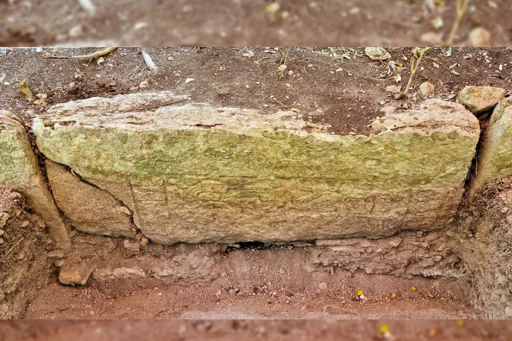 An inscribed stone found at the Ocomtún site