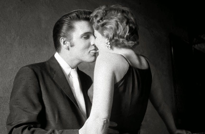 Elvis Presley kissing