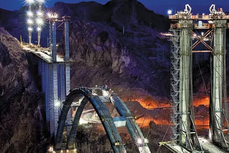 The bridge, which is awaiting decking and with temporary pylons in September 2009, was built to bypass the part of U.S. Route 93 that crosses the Hoover Dam.