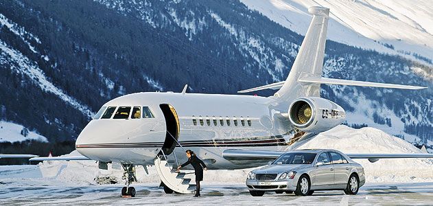 A Dassault Falcon 2000, a Maybach luxury auto, and freshly swept stairs: NetJets set up this publicity shot in Switzerland, but for fractional jet owners, such fantasy is the reality.