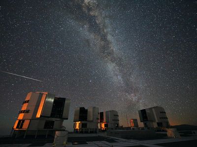 A meteor from the Perseids is seen falling over the Very Large Telescope array in Chile.