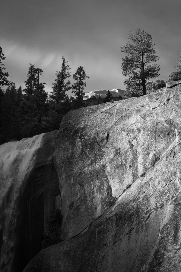 Woman on Cliff's Edge in Yosemite National Park thumbnail