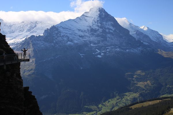 hiker on cliff walk, burnese alps, switzerland thumbnail