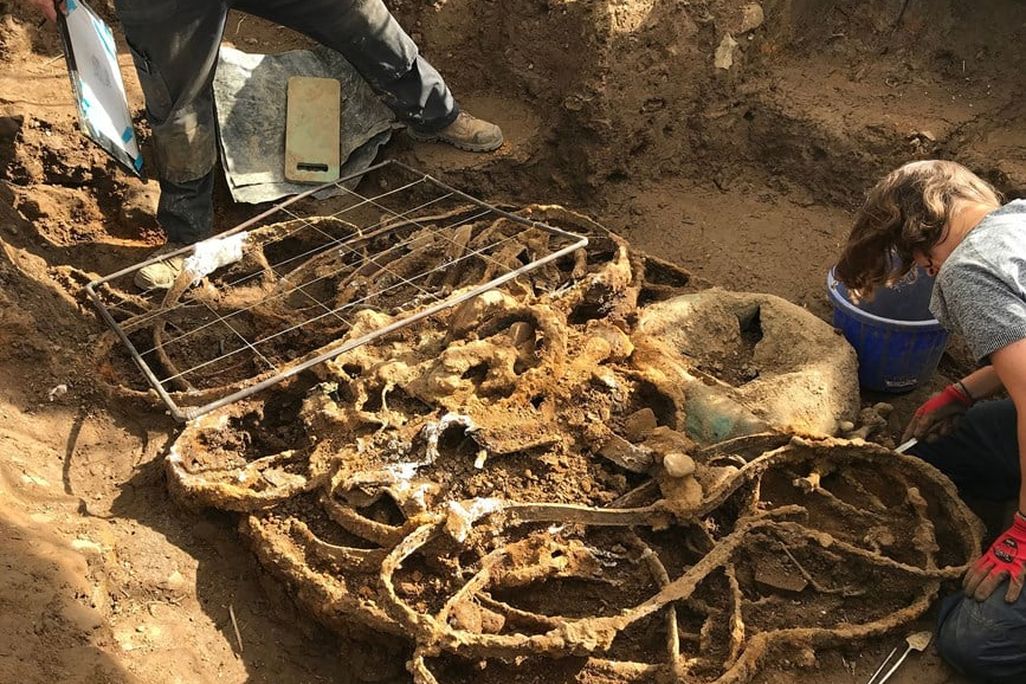 Archaeologists digging up Iron Age artifacts
