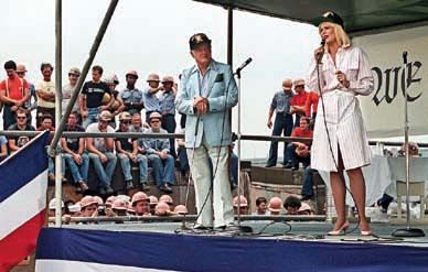 Bob Hope and actress Ann Jillian entertain sailors and shipyard workers on the USS Forrestal in 1984.