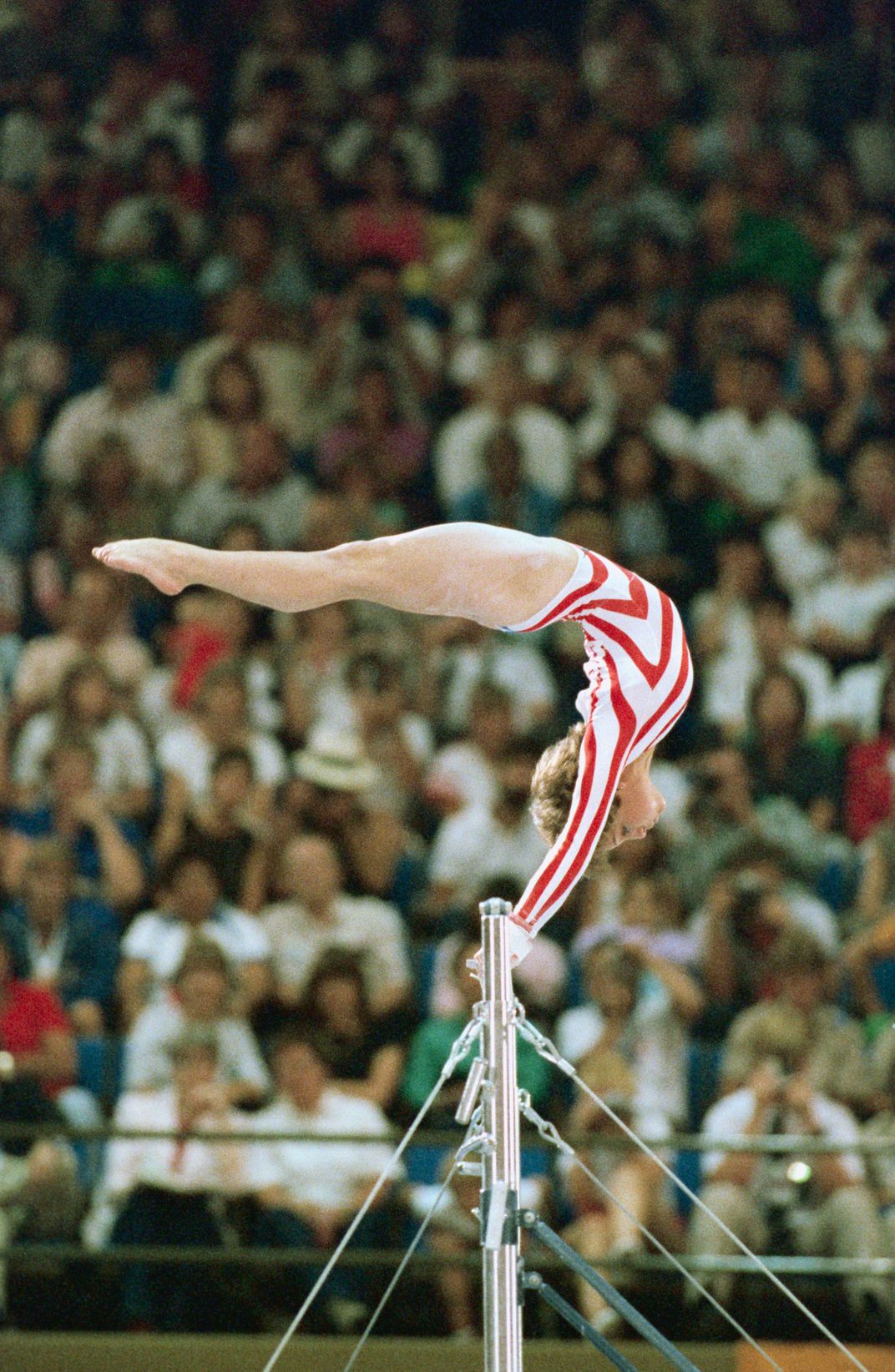 Mary Lou Retton performing on the uneven bars in Los Angeles