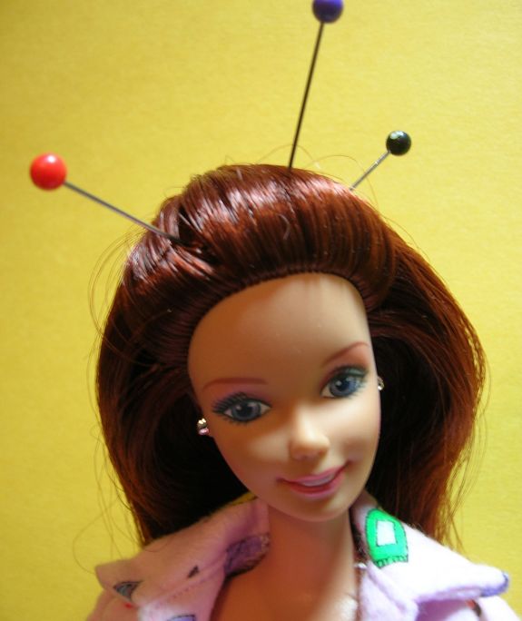 Acupuncture Barbie suffers from chronic pain.