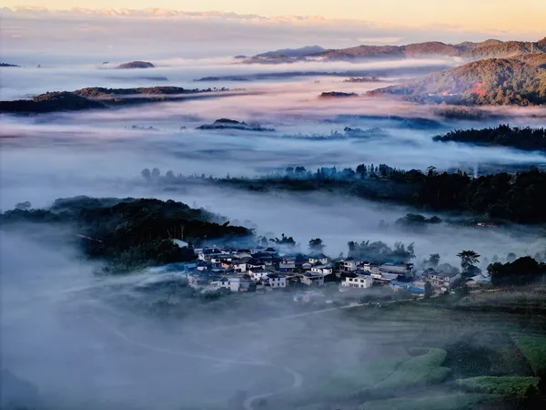 Mountain village in the mist thumbnail