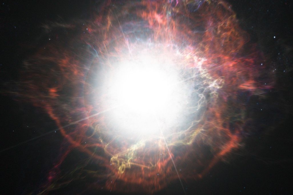 Artist’s_impression_of_dust_formation_around_a_supernova_explosion.jpg