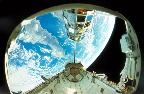 The view of Earth from inside a NASA space shuttle.