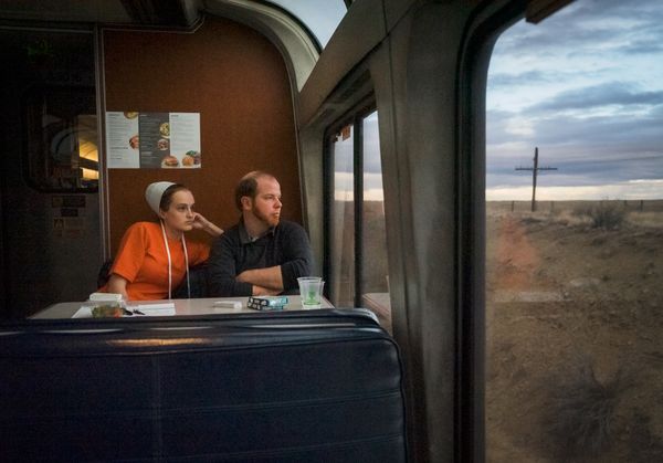 Dining Car Couple aboard Amtrak train. thumbnail