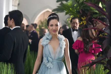 Constance Wu's character, Rachel Chu, wears the gown to a wedding