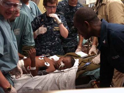 100119-N-8366W-067
ATLANTIC OCEAN (Jan. 19, 2010) Medical professionals aboard the Military Sealift Command hospital ship USNS Comfort (T-AH 20) treat a six-year-old Haitian boy in the casualty receiving room aboard the 1,000-bed hospital ship. The boy transferred to Comfort by helicopter from the aircraft carrier USS Carl Vinson (CVN 70) for treatment for an injury to his bladder and a hip fracture during an earthquake that struck Haiti on Jan 12. The boy is in the intensive care unit aboard Comfort in stable condition. Comfort is supporting Operation Unified Response, a joint operation providing humanitarian assistance to Haiti. (U.S. Navy photo by Mass Communication Specialist 3rd Class Timothy Wilson/Released)