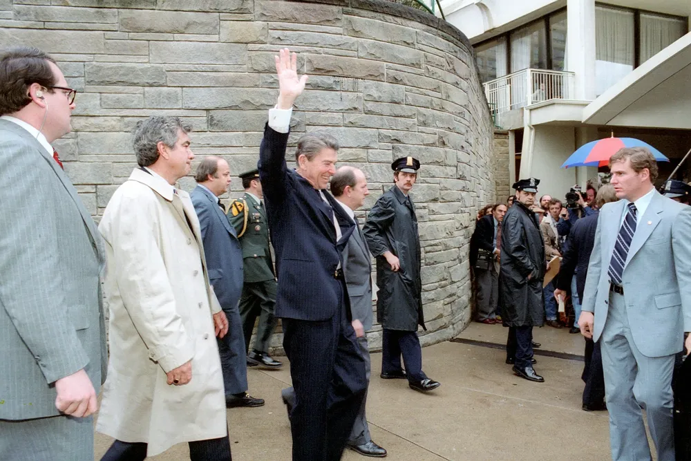 President Ronald Reagan, pictured waving to a crowd shortly before John Hinckley Jr. tried to assassinate him on March 30, 1981.