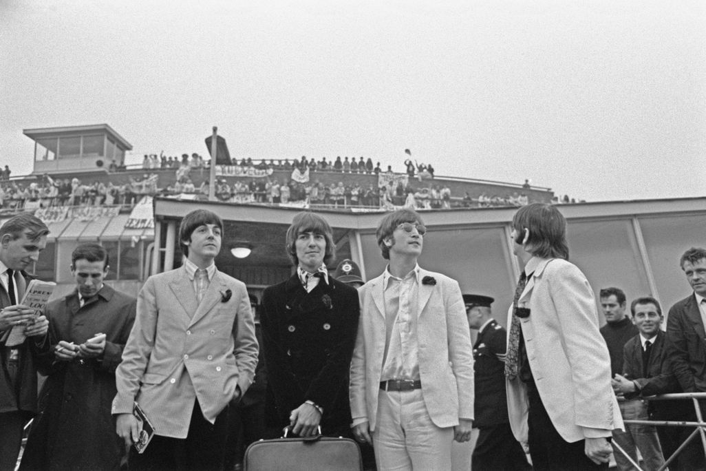 The Beatles arrive back at London Airport after their final concert tour of the United States.