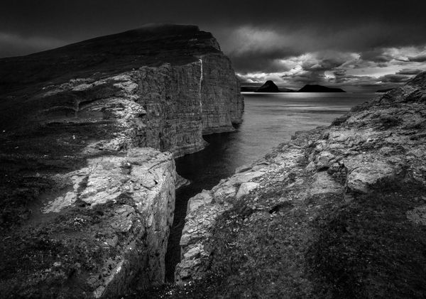 Cliffs of the Faroe Islands largest lake that empties into the sea thumbnail