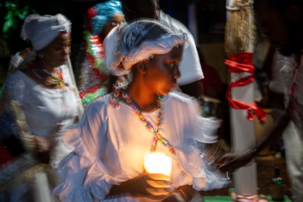 A Young Vodou Priestess Participates in a Ceremony thumbnail