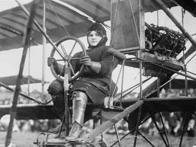 Blanche Stuart Scott at the controls of a Curtiss Model D, circa 1910. Scott was the first woman taught to fly by Glenn Curtiss.