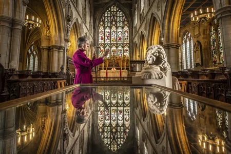 Bishop of Hull Alison White blesses a statue of Aslan, a character from C.S. Lewis' The Chronicles of Narnia, at St. Mary’s Church in Beverley, East Yorkshire.