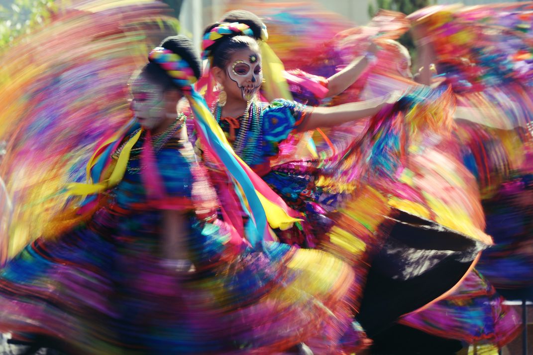 Young girls dance at festival