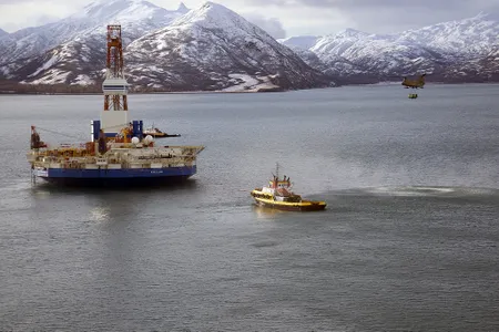 A Chinook helicopter caries supplies to the stranded Kulluk oil drilling platform in January.