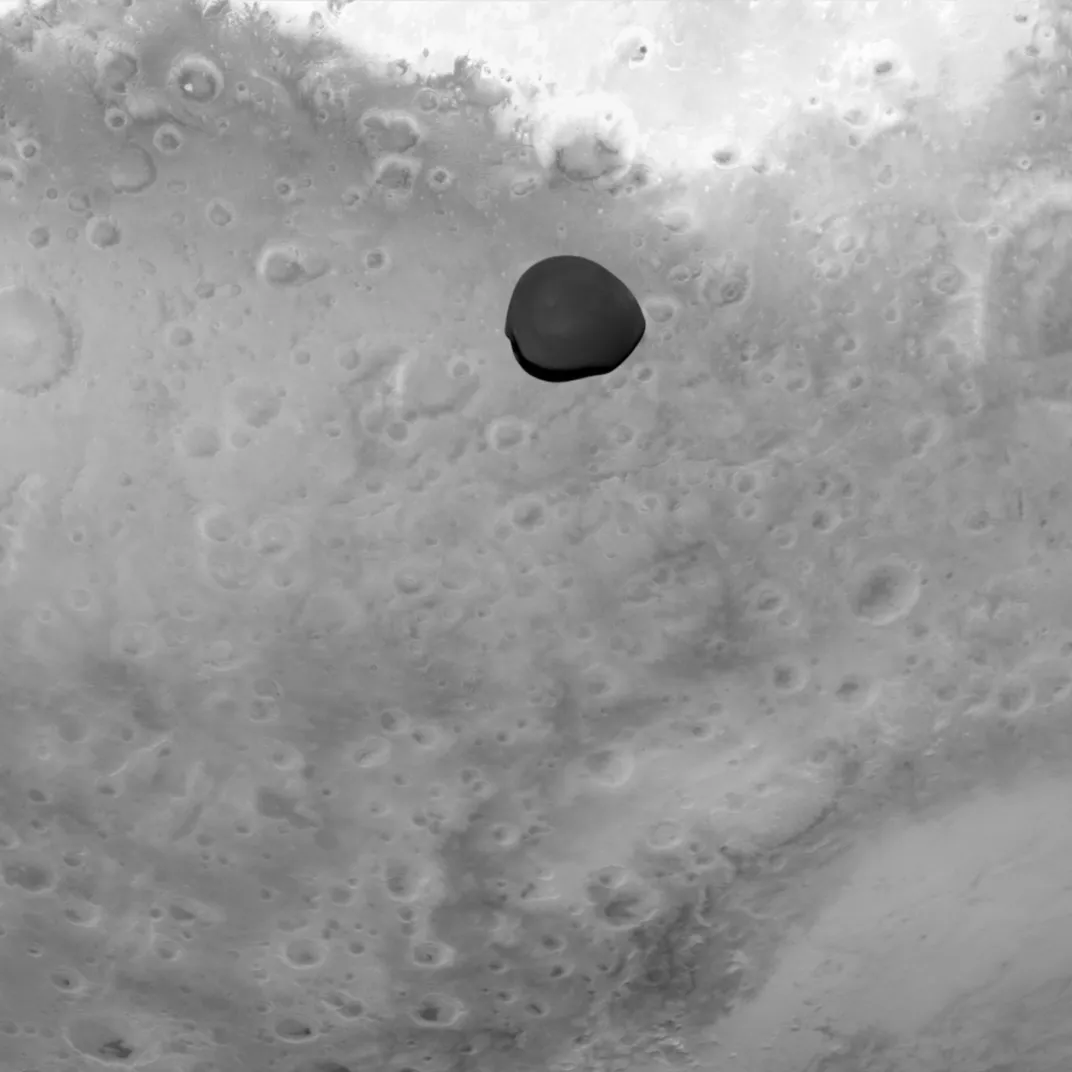 black and white Mars and Deimos viewed by Hera's Asteroid Framing Camera