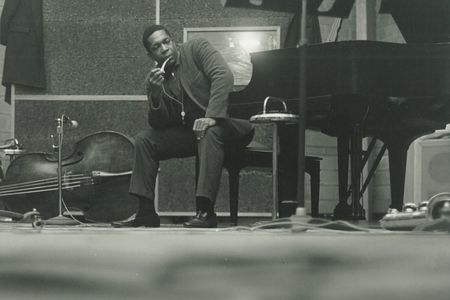 John Coltrane (left) “took it further than any [other] tenor saxophone player,”  says photographer Chuck Stewart.
