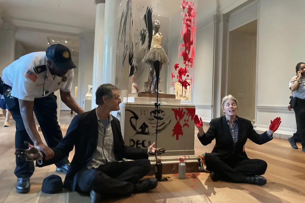 Protesters in front of Little Dancer