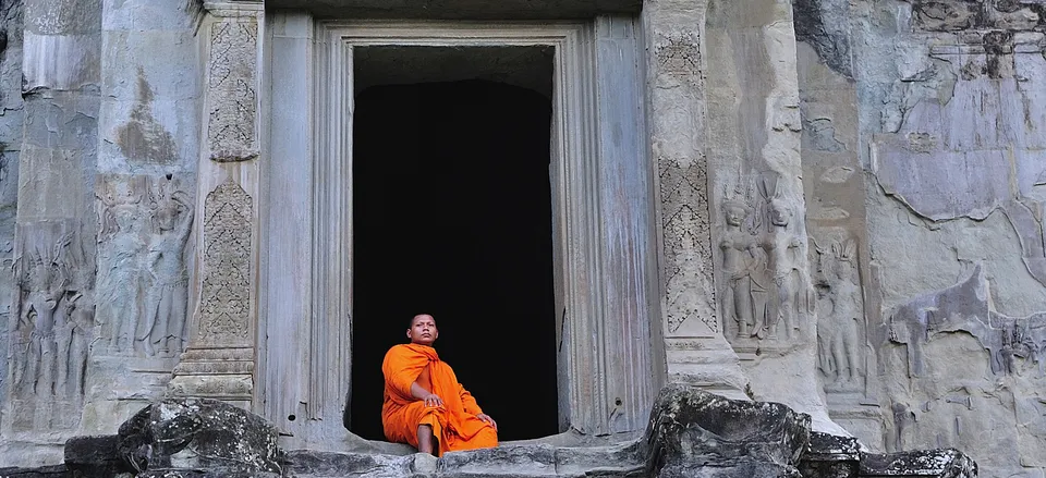  Monk in doorway at Angkor Wat 