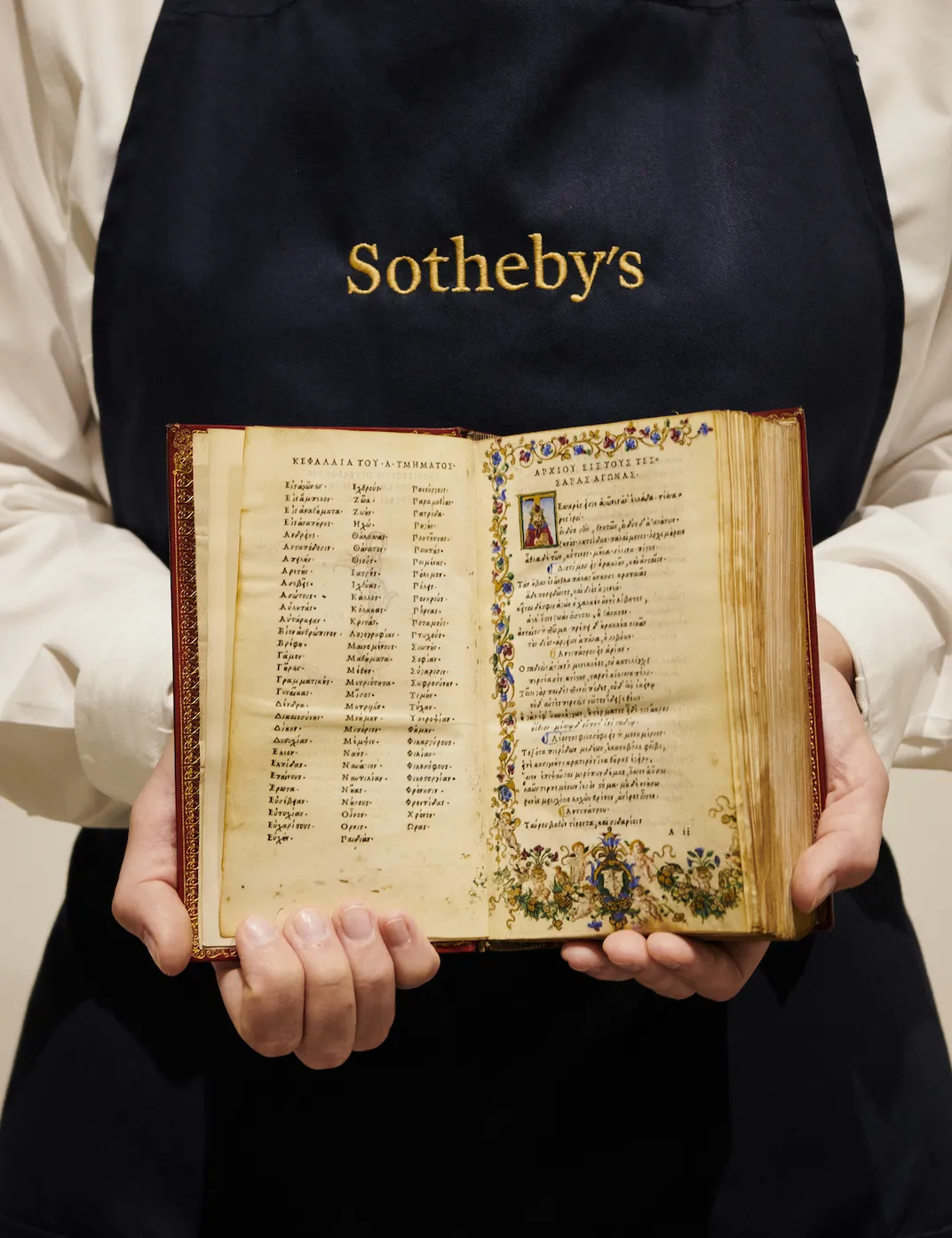 Person holding open beautiful book