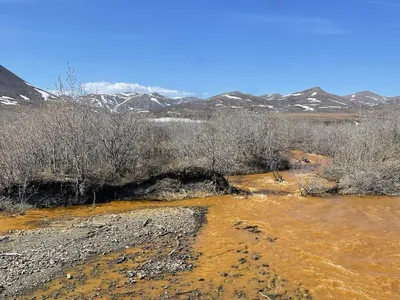 An orange tributary of the Kugororuk River.