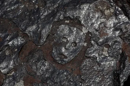 A historic drought in the Amazon has revealed faces carved in the rocky banks of the Rio Negro in Brazil.