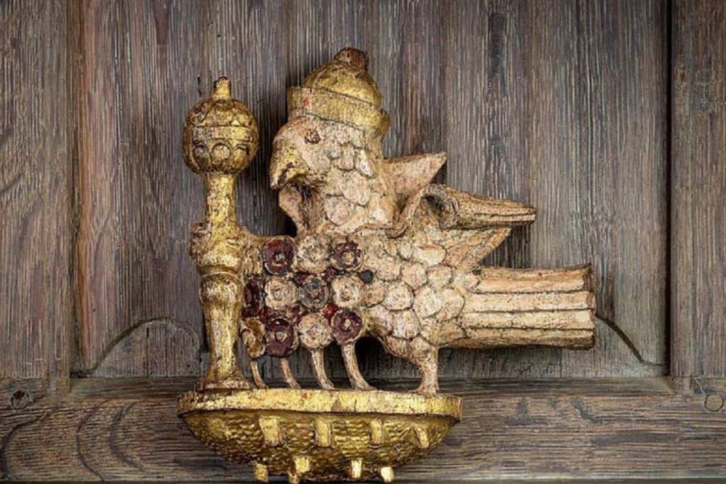 gilded falcon carving