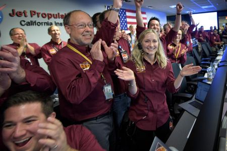 Members of the Mars InSight team celebrate their spacecraft's safe landing in November 2018.