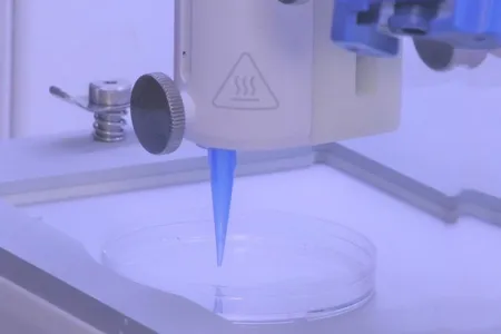 The researchers turned living human skin cells into a liquid "bio ink."