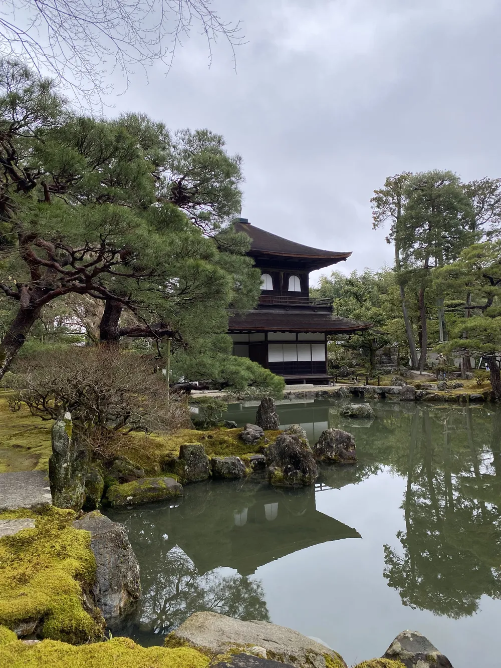 Ginkaku-ji temple in Kyoto reflection on the water.