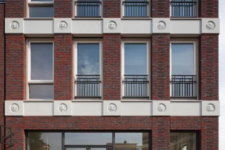 Emoji cover the facade of this Dutch building.
