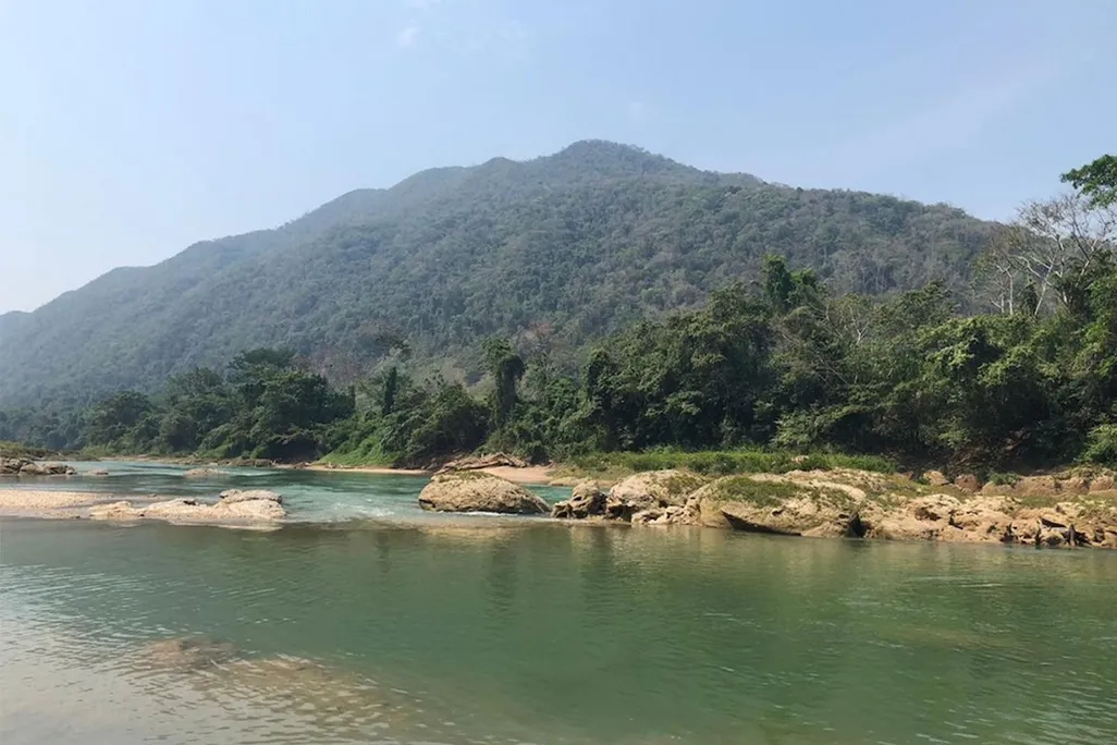 View of a hill next to a river in Mexico