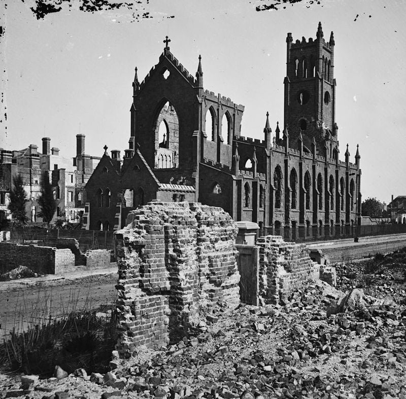 The surviving brick structure of the Catholic Cathedral of St. John and St. Finbar, after the Great Fire of 1861